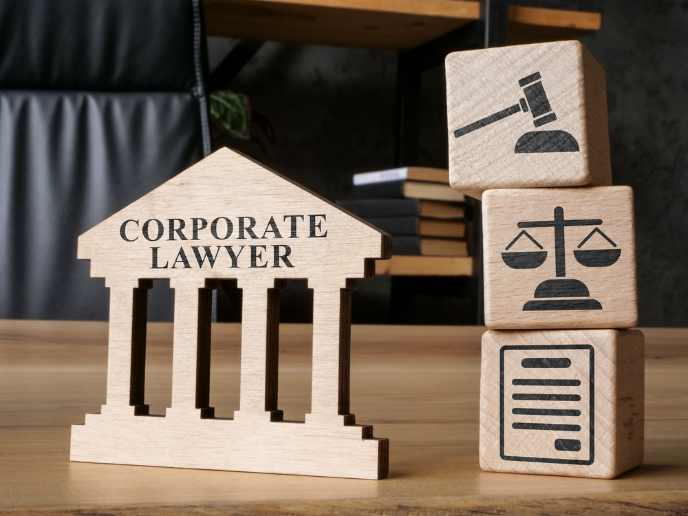 A corporate lawyer sign next to law firm